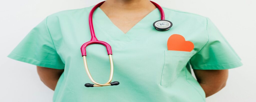 picture of doctor with image of human heart associated with blog on personal injury anatomy cardiovascular system
