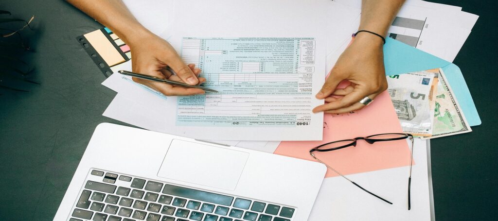 Picture of person reviewing financial data associated with blog on expert witness financial data
