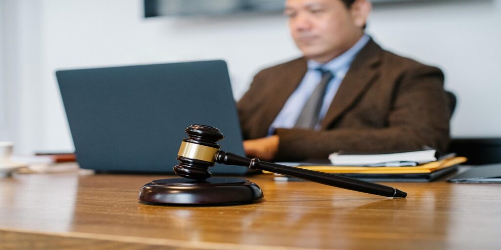 Picture of person testifying associated with blog on testimony of treating doctors