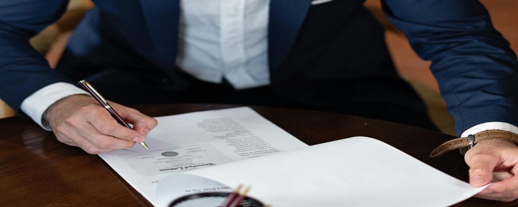 Picture of attorney writing associated with attorney work product doctrine