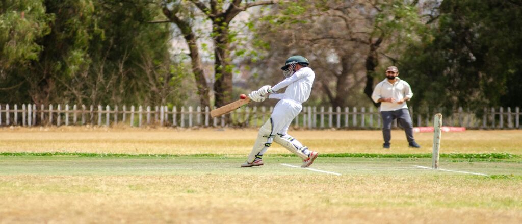Picture of cricket player hitting ball and about to run associated with blog on car accident leaving scene
