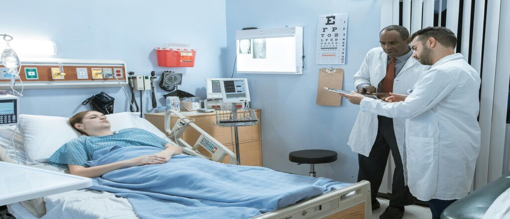 Picture of doctors talking associated with blog on medical malpractice communication issues