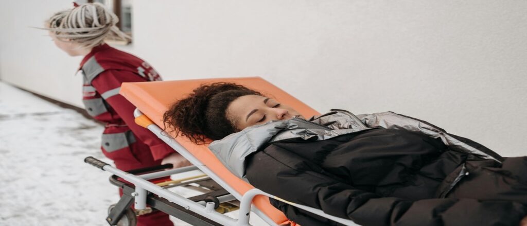 Picture of injured person on a stretcher associated with blog on personal injury medicaid liens