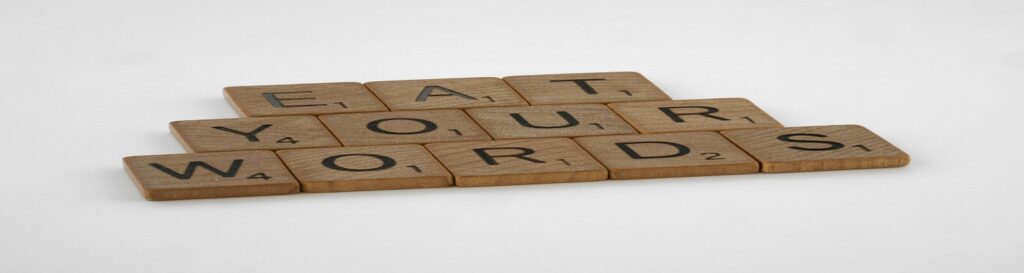 Pix of "Eat Your Words" as part of article on insurers making admissions