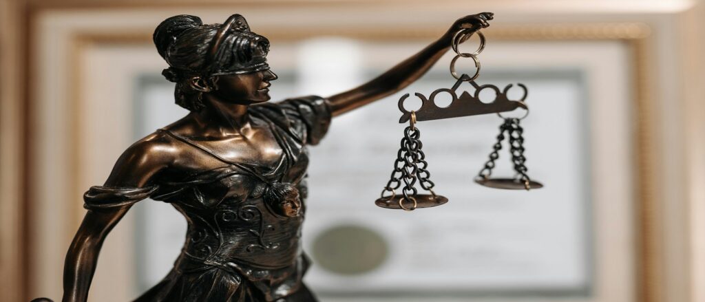 Picture of scales of justice associated with blog on greater weight of evidence