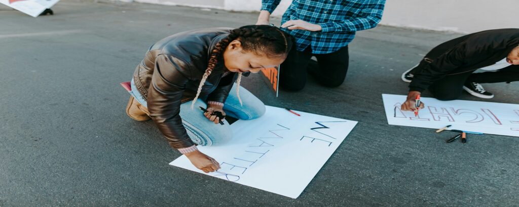 Picture of people drawing on the street associated with blog on civil conspiracy