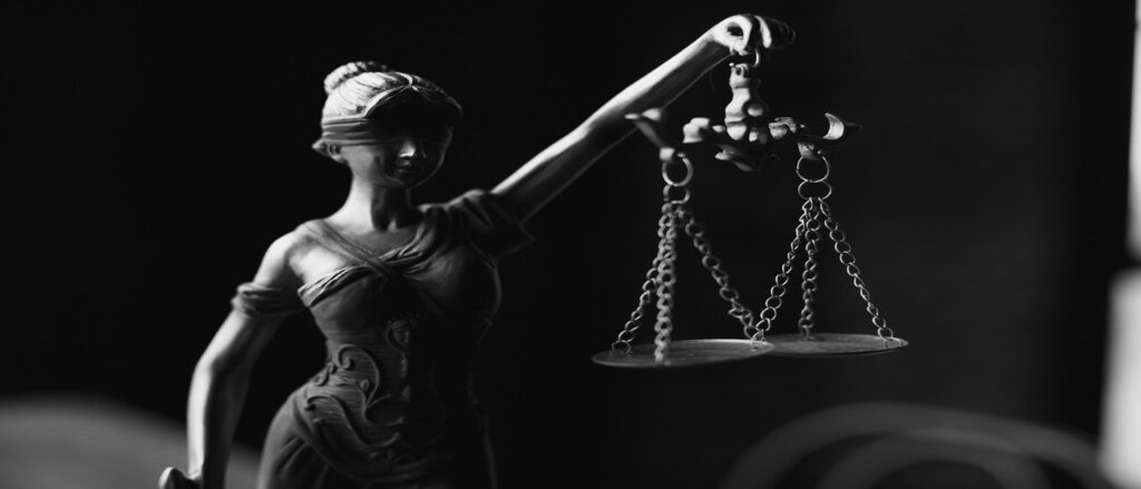 Picture of scales of justice associated with blog on affirmative defenses auto accidents