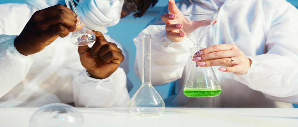 Picture of doctors dealing with liquids in vials associated with blog on infection medical malpractice