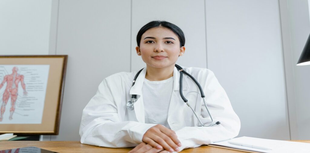 Picture of physician with stethoscope around her neck associated with blog on medical malpractice breach