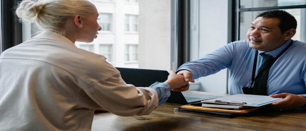 Picture of two people shaking hands associated with blog on employer's duty in personal injury