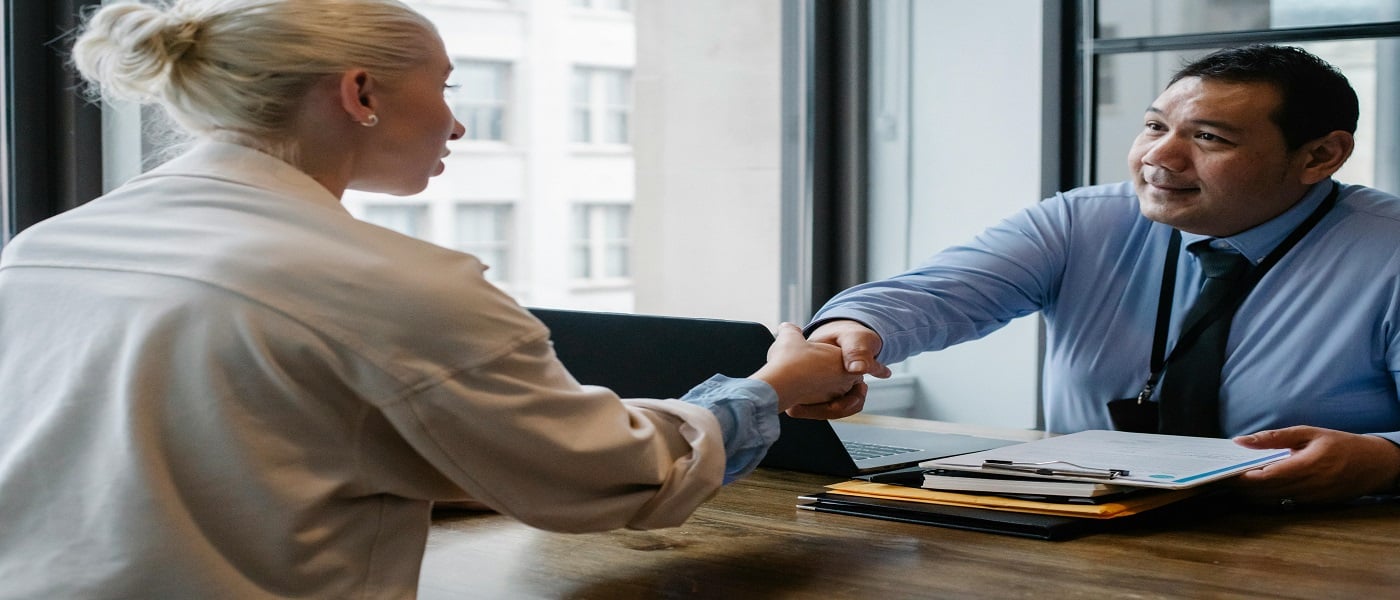 Picture of two people shaking hands associated with blog on employer's duty in personal injury